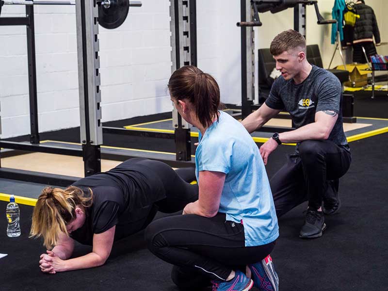 personal trainer with a personal training programme